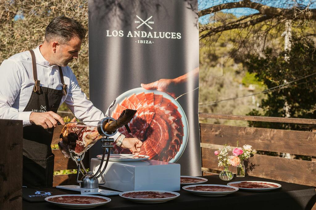 private chef cutting jamon at luxury villa
